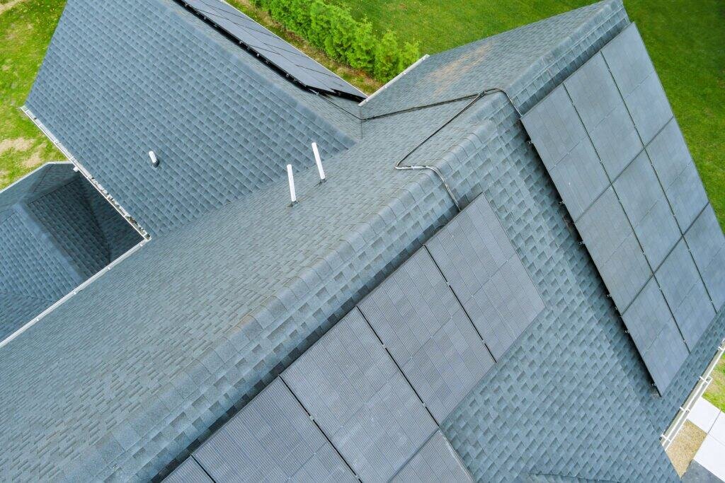 High-efficiency solar panels installed on a residential roof for sustainable energy.